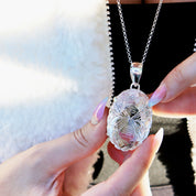 clear quartz oval etched silver gemstone pendant