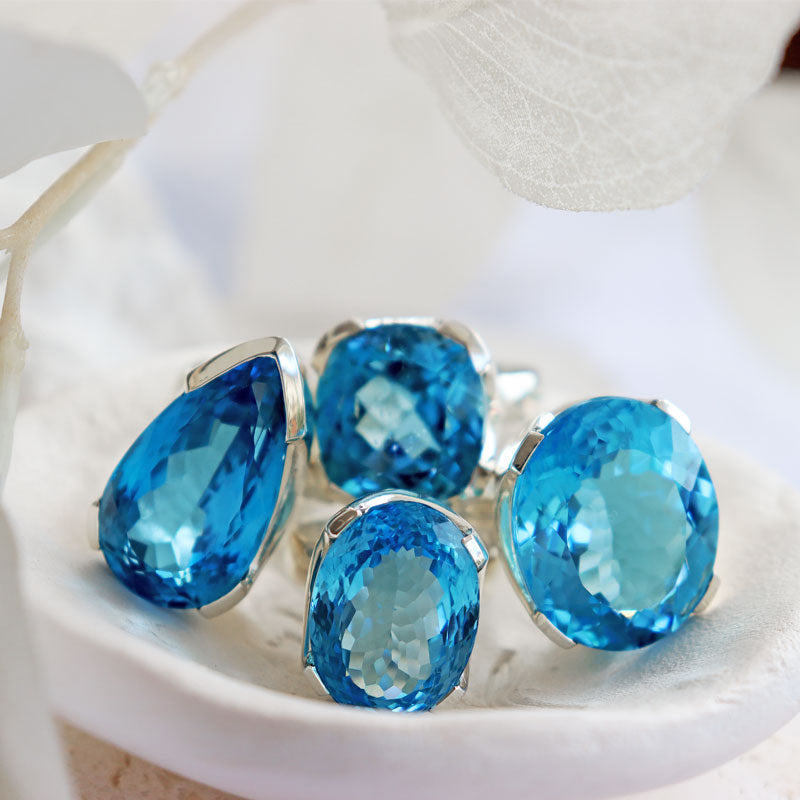 large teardrop swiss blue topaz silver gemstone ring