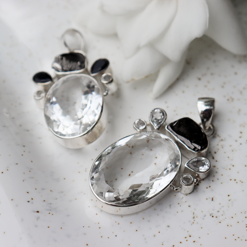 clear quartz hematite sterling silver pendant