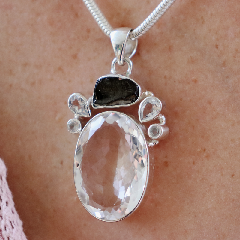 clear quartz hematite sterling silver pendant