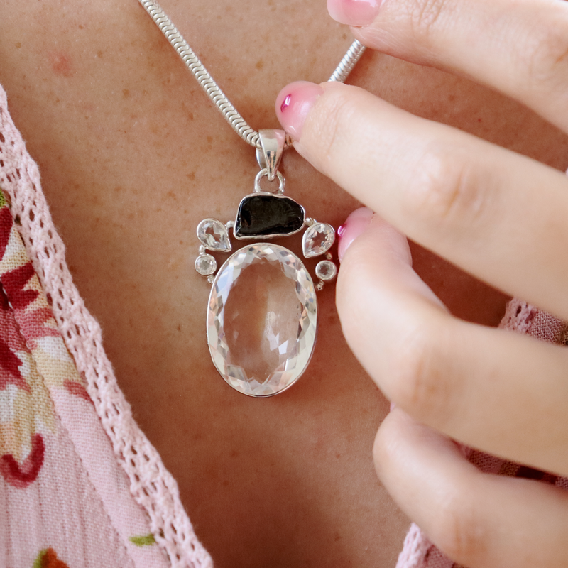 clear quartz hematite sterling silver pendant