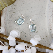 blue topaz emerald cut sterling silver earrings