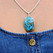 oval copper turquoise sterling silver gemstone pendant