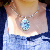 large turquoise gemstone silver pendant