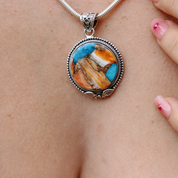 oyster turquoise round sterling silver pendant