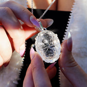 clear quartz oval etched silver gemstone pendant