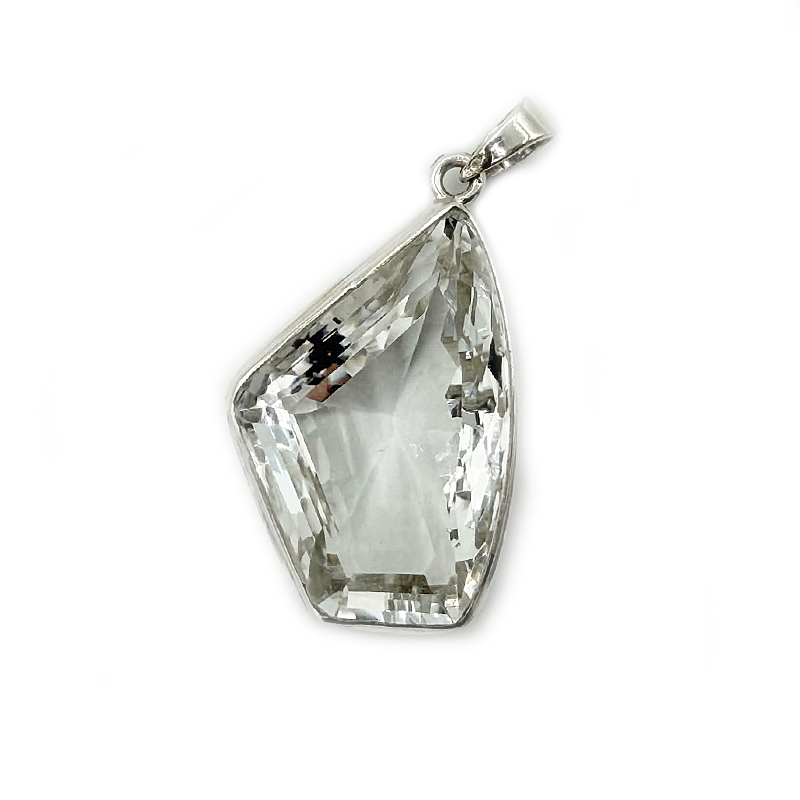 Teardrop-shaped crystal pendant on a white background